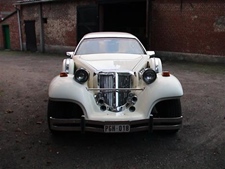 Oldtimer te huur: Excalibur cougar (wit)