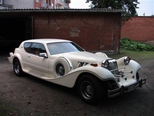 Oldtimer te huur: Excalibur cougar (wit)