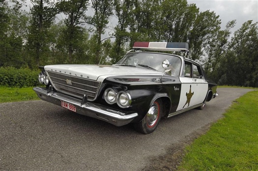 Oldtimer te huur: Chrysler Politiewagen